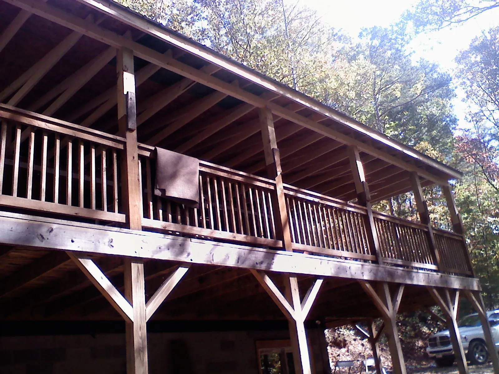 Timber framing under a new elevated porch and deck — Roof Leak Repair in Owingsville by Roofing Brothers